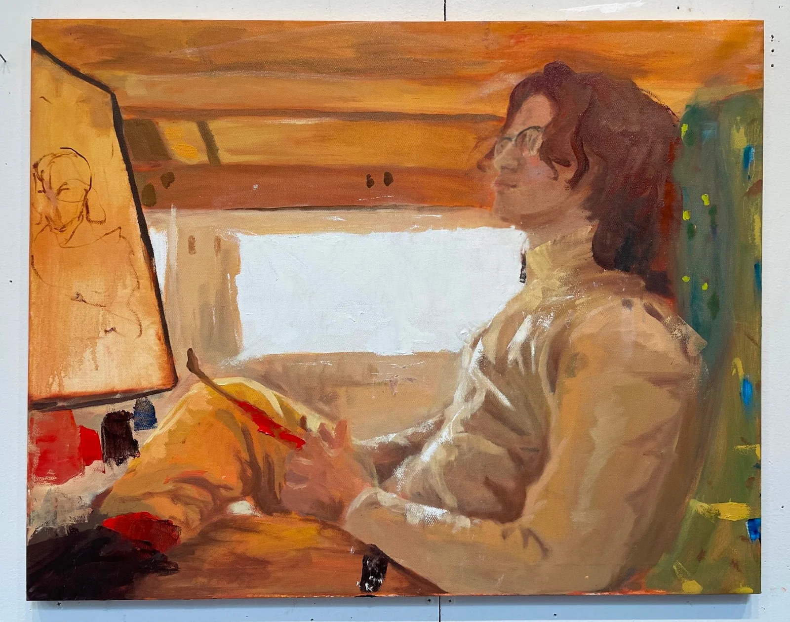 A young dude with shoulder-length brown hair and specs is painting in a cozy room. He's rocking a white shirt and yellow pants, clutching a brush in his right hand. A canvas with some scribbles sits on a table, and the room is bathed in warm, yellowish light. The painting's got a loose, impressionistic style.